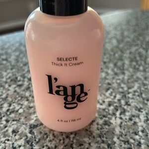 Never used! L’ange  4 fl oz. Thick it cream.